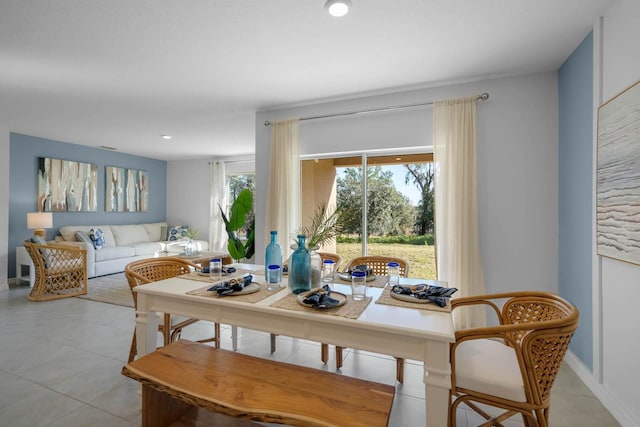 dining space with baseboards