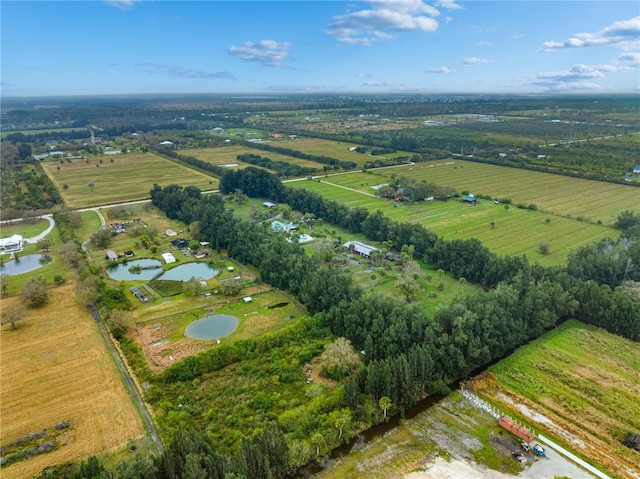 aerial view featuring a rural view and a water view