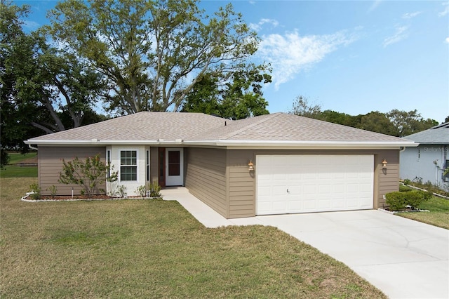 single story home featuring a garage, driveway, roof with shingles, and a front yard