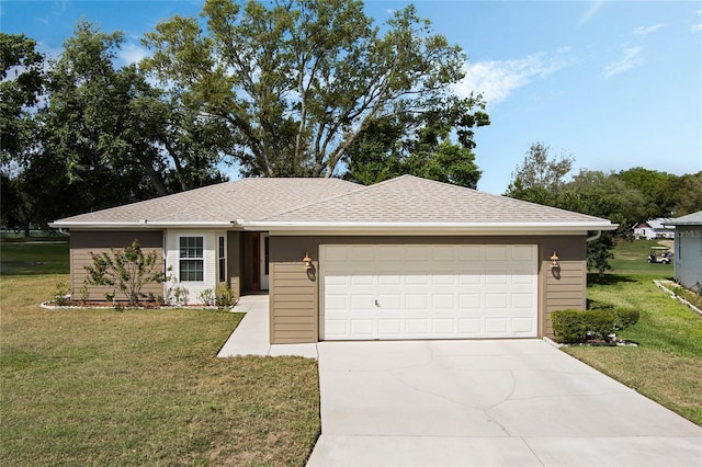 ranch-style home featuring driveway, an attached garage, a front yard, and roof with shingles