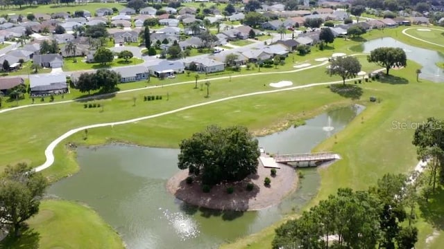 bird's eye view with a residential view, view of golf course, and a water view