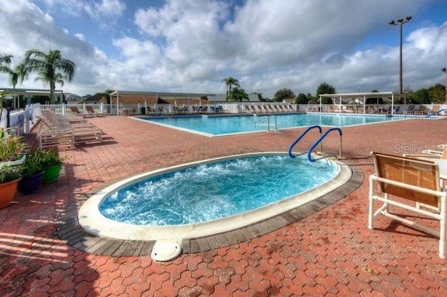 pool with a patio