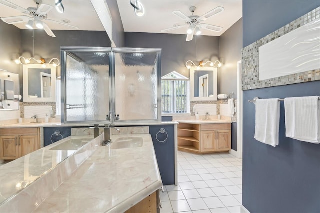 full bath with a sink, backsplash, a ceiling fan, and tile patterned floors