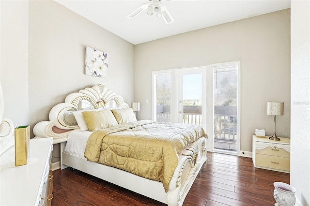 bedroom featuring access to exterior, baseboards, dark wood-style flooring, and ceiling fan