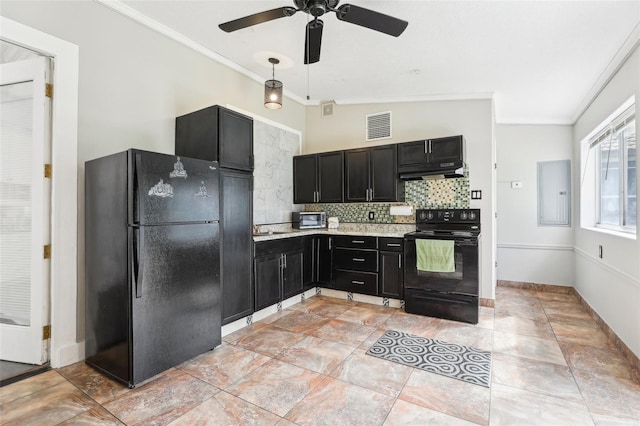 kitchen featuring dark cabinetry, visible vents, decorative backsplash, black appliances, and under cabinet range hood