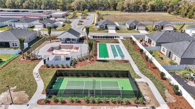 birds eye view of property with a residential view