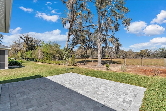 view of yard with a patio area and fence