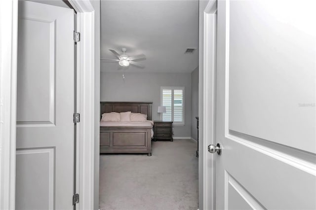 bedroom featuring visible vents and carpet flooring