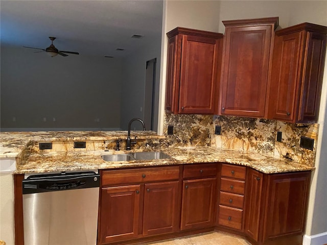 kitchen featuring a ceiling fan, dishwasher, light stone counters, backsplash, and a sink