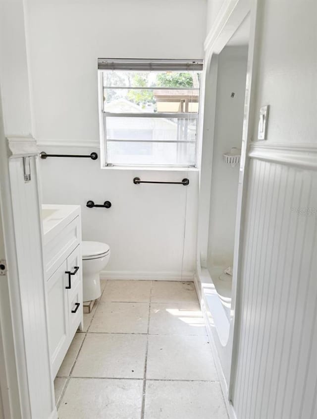 bathroom featuring toilet and vanity