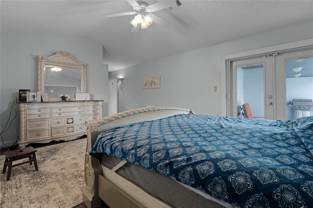 bedroom featuring a textured ceiling, a ceiling fan, visible vents, vaulted ceiling, and access to exterior