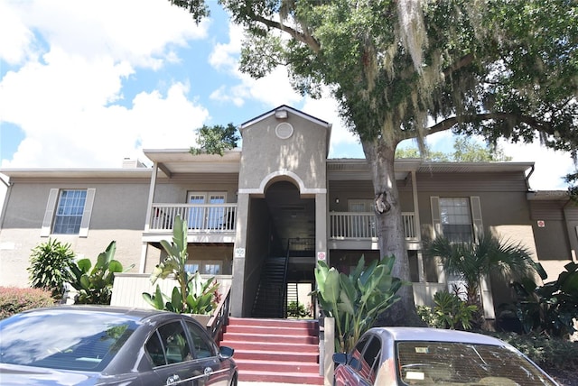 view of building exterior featuring stairway