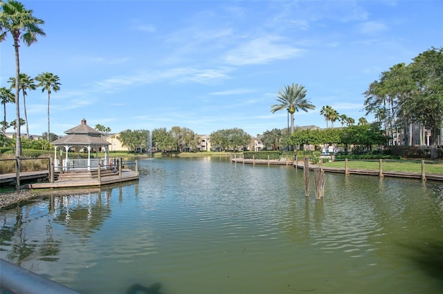 dock area featuring a gazebo and a water view