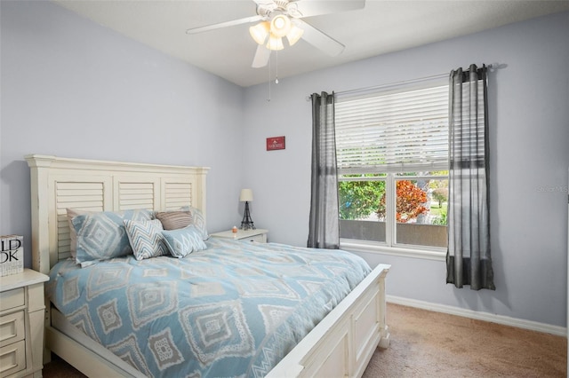 12824 Penshurst Ln, Windermere, FL 34786 - bedroom with baseboards, ceiling fan, and light colored carpet