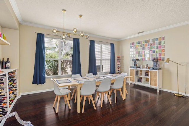 12824 Penshurst Ln, Windermere, FL 34786 - dining area with a textured ceiling, ornamental molding, wood finished floors, and a healthy amount of sunlight