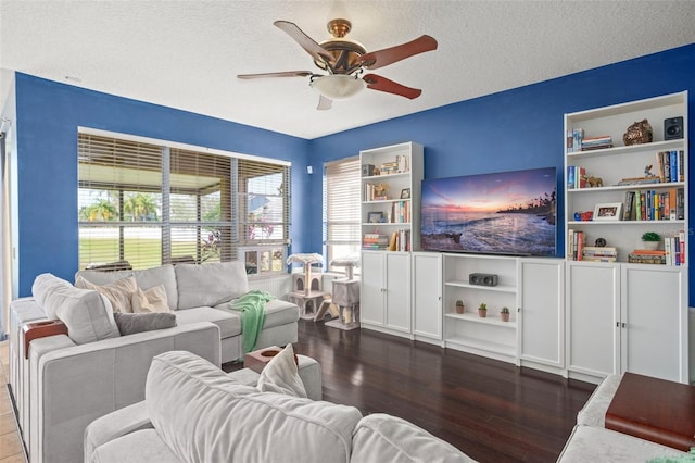 12824 Penshurst Ln, Windermere, FL 34786 - living area featuring a textured ceiling, ceiling fan, and wood finished floors