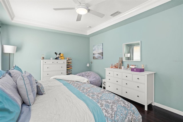 12824 Penshurst Ln, Windermere, FL 34786 - bedroom with dark wood-type flooring, a raised ceiling, visible vents, and baseboards