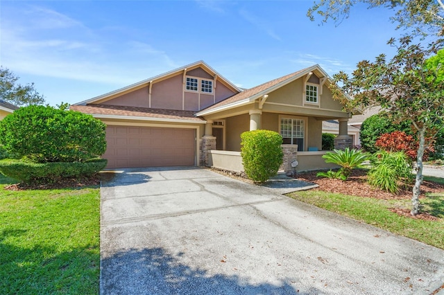 12824 Penshurst Ln, Windermere, FL 34786 - craftsman-style house featuring concrete driveway, an attached garage, and stucco siding