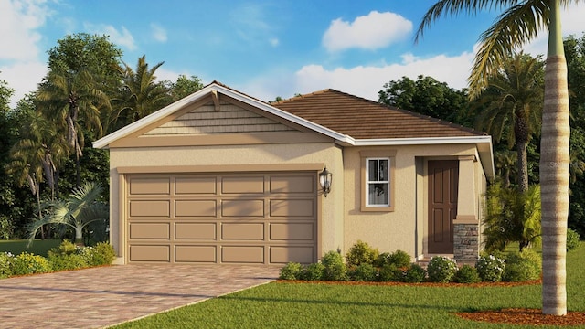 view of front of home with an attached garage, a tile roof, decorative driveway, stucco siding, and a front lawn