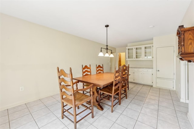 dining area with light tile patterned floors