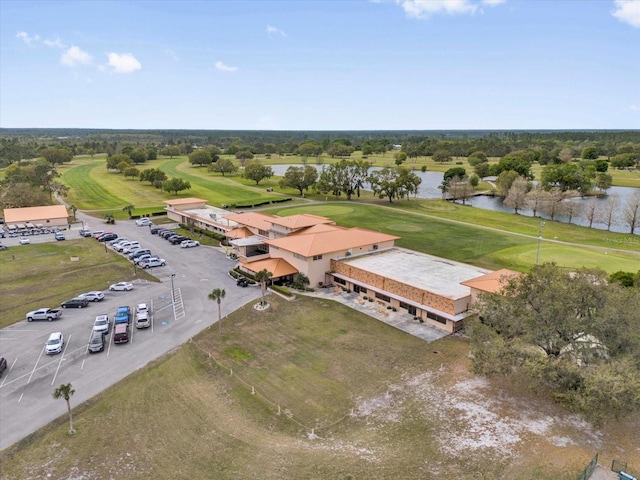 2430 Park Ave, Indian Lake Estates, FL 33855 - drone / aerial view of a large body of water, a golf course, and a tree filled landscape