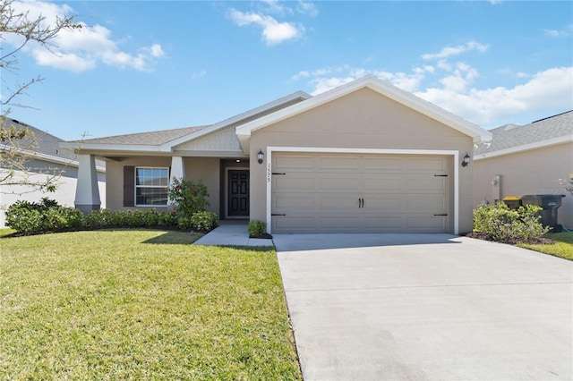 ranch-style house with a garage, stucco siding, concrete driveway, and a front lawn