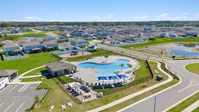 aerial view featuring a residential view and a water view