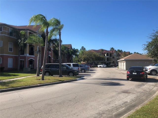 view of street with curbs