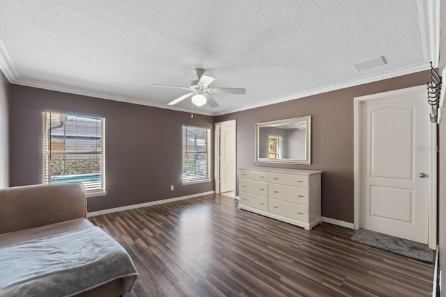 unfurnished bedroom featuring visible vents, ornamental molding, and dark wood-type flooring