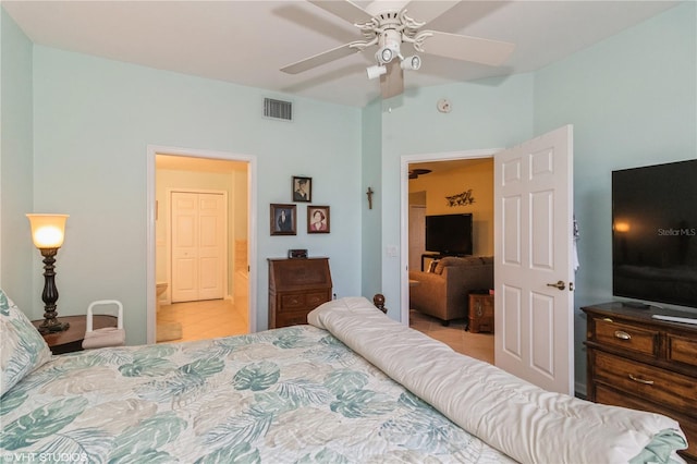 tiled bedroom featuring visible vents and a ceiling fan