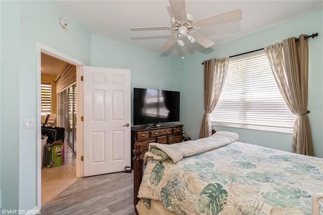 bedroom featuring a ceiling fan and wood finished floors