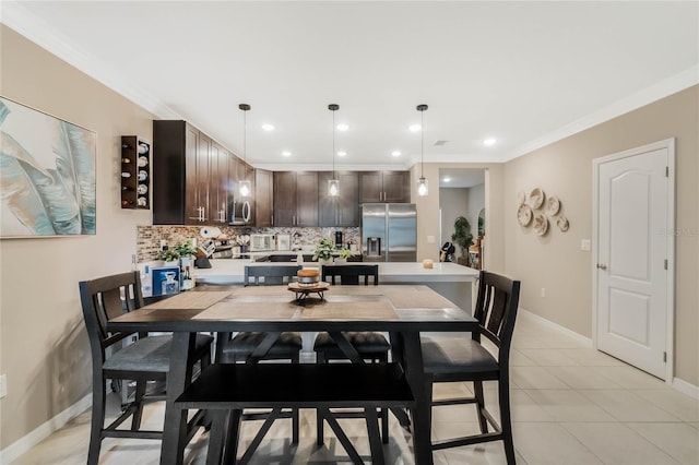 dining room featuring recessed lighting, light tile patterned flooring, crown molding, and baseboards