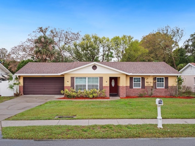 ranch-style home with brick siding, roof with shingles, concrete driveway, an attached garage, and a front lawn