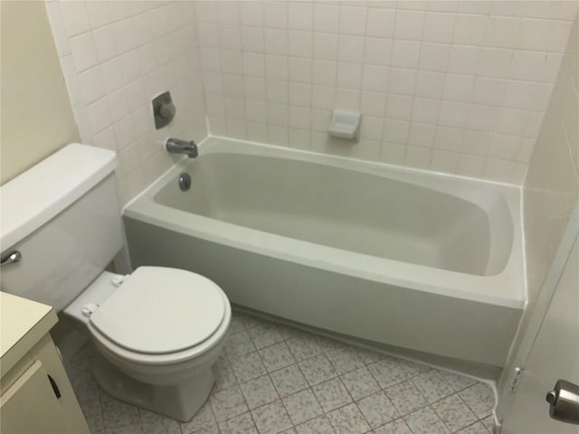 full bath featuring vanity and toilet