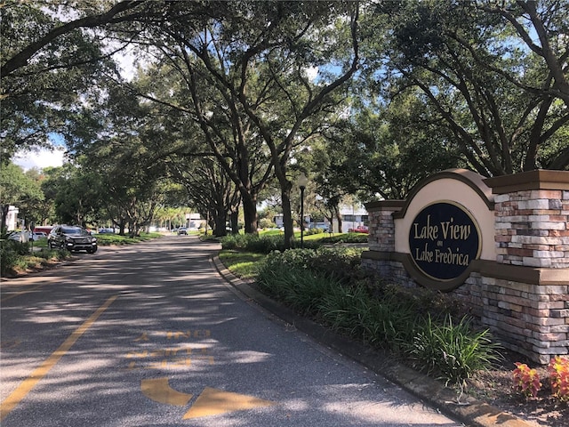 view of street featuring curbs