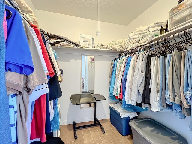 562 Orange Dr Unit 33, Altamonte Springs, FL 32701 - walk in closet featuring wood finish floors