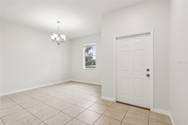 1893 Rafton Rd, Apopka, FL 32703 - entryway featuring baseboards, an inviting chandelier, and light tile patterned floors
