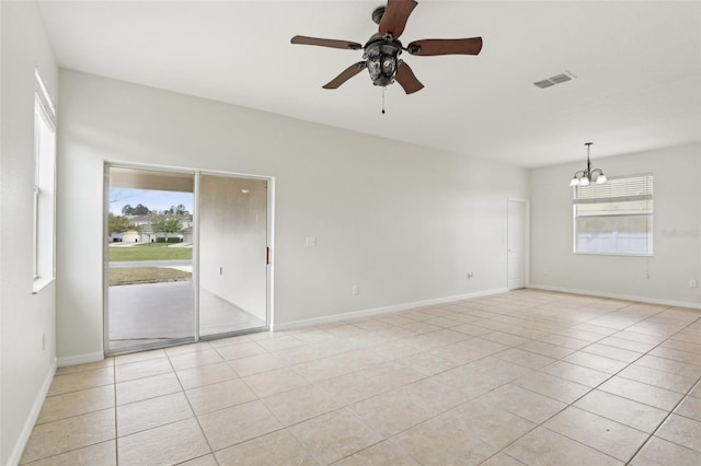 1893 Rafton Rd, Apopka, FL 32703 - empty room with visible vents, a wealth of natural light, and light tile patterned flooring