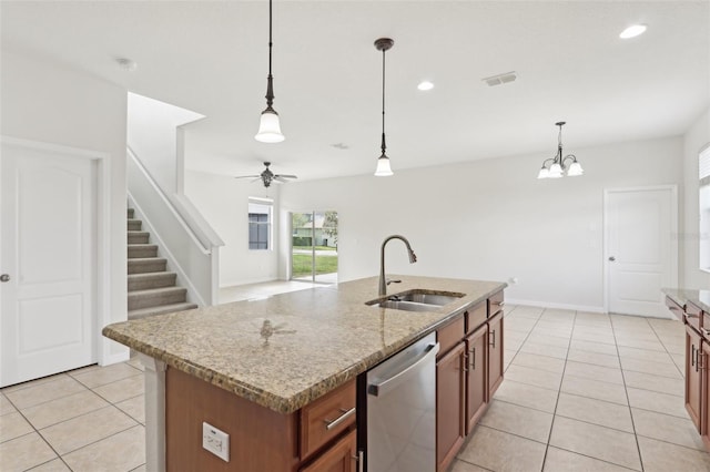 1893 Rafton Rd, Apopka, FL 32703 - kitchen featuring a sink, visible vents, brown cabinets, dishwasher, and decorative light fixtures