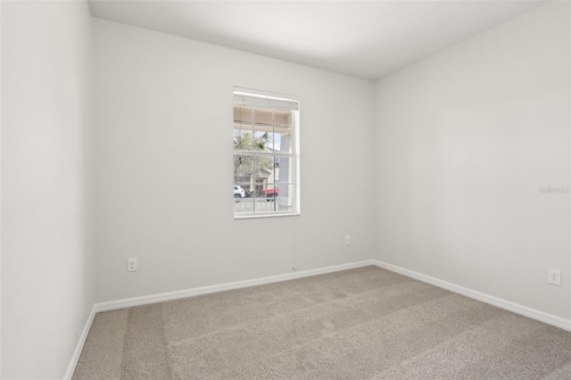 1893 Rafton Rd, Apopka, FL 32703 - carpeted empty room featuring baseboards