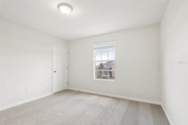 1893 Rafton Rd, Apopka, FL 32703 - unfurnished room with light colored carpet and baseboards