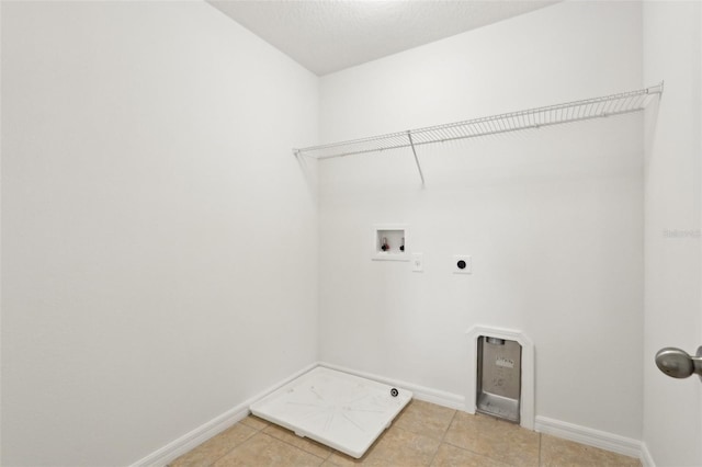 1893 Rafton Rd, Apopka, FL 32703 - clothes washing area featuring laundry area, baseboards, washer hookup, and hookup for an electric dryer