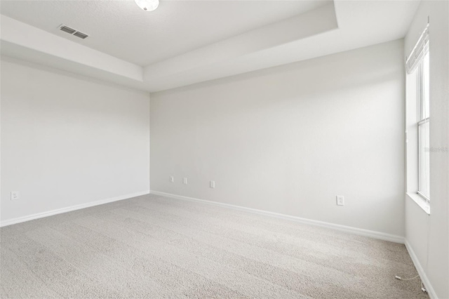 1893 Rafton Rd, Apopka, FL 32703 - carpeted spare room with a raised ceiling, visible vents, and baseboards