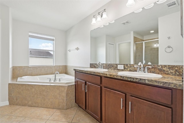 1893 Rafton Rd, Apopka, FL 32703 - bathroom with a bath, a sink, visible vents, and tile patterned floors