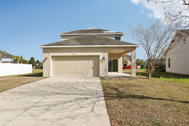 1893 Rafton Rd, Apopka, FL 32703 - view of front of house featuring stucco siding, fence, a garage, driveway, and a front lawn