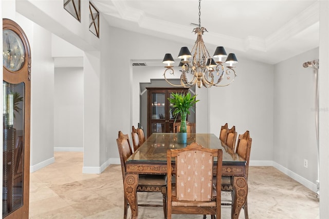 dining area with baseboards, visible vents, a raised ceiling, ornamental molding, and a chandelier