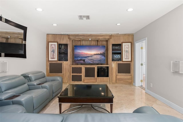 living area featuring recessed lighting, marble finish floor, visible vents, and baseboards