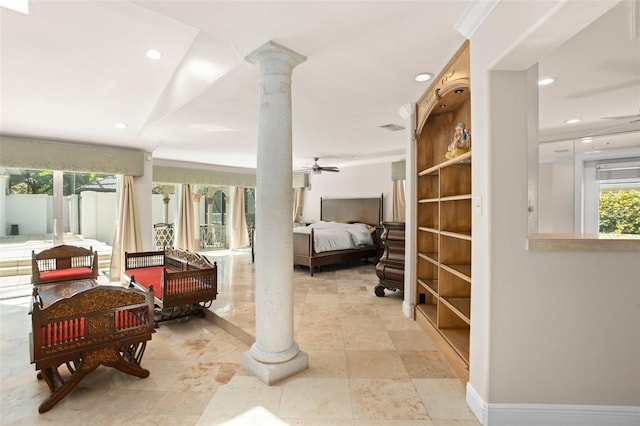 bedroom featuring recessed lighting, decorative columns, and baseboards