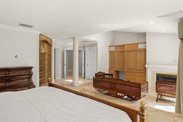 bedroom with lofted ceiling, decorative columns, visible vents, and recessed lighting