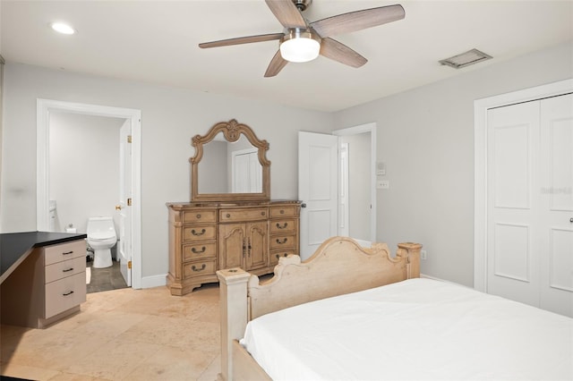 bedroom featuring a closet, visible vents, a ceiling fan, connected bathroom, and baseboards